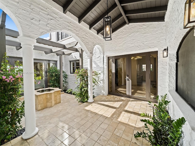 view of patio / terrace featuring french doors