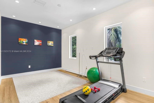 workout room with light wood-type flooring