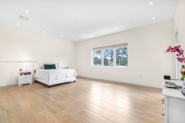 bedroom featuring light wood-type flooring