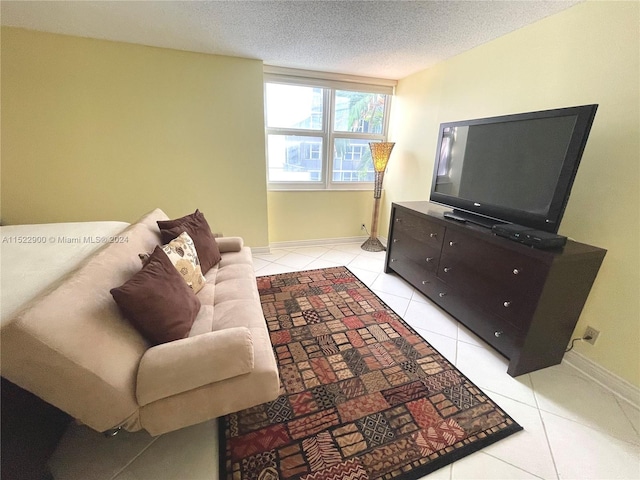 tiled living room with a textured ceiling