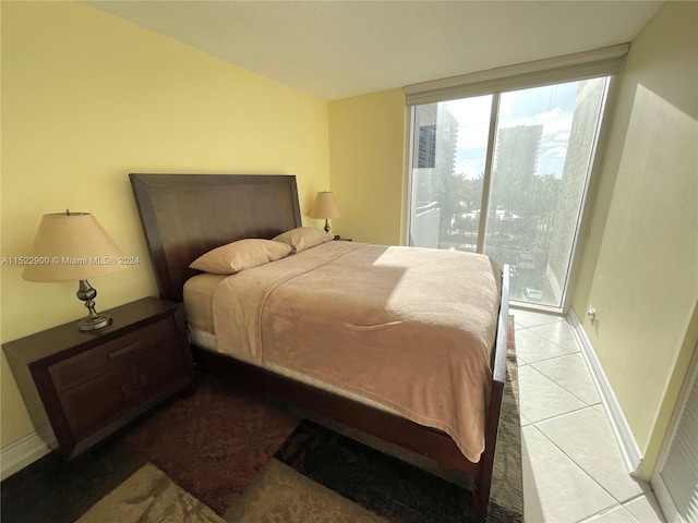 bedroom with light tile flooring