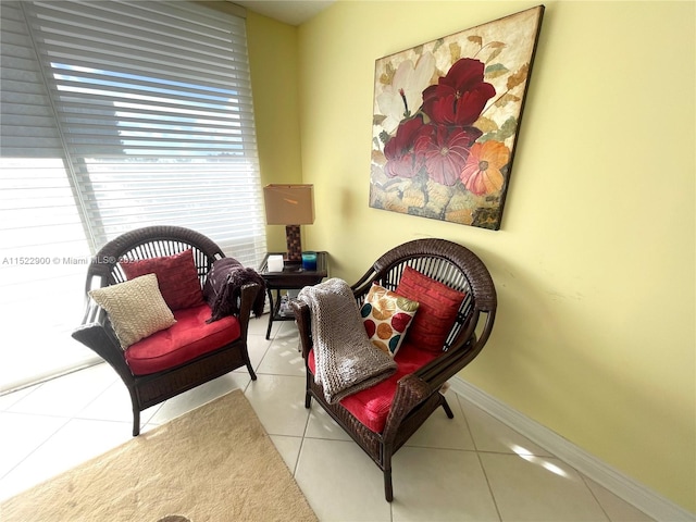 living area featuring light tile floors