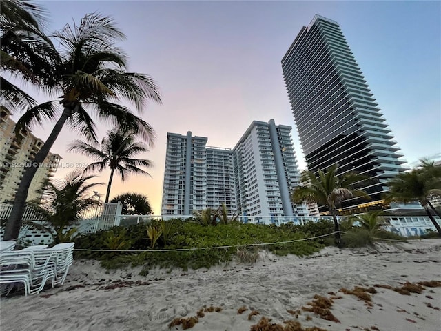 view of outdoor building at dusk