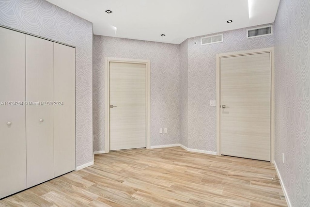 unfurnished bedroom featuring light hardwood / wood-style flooring