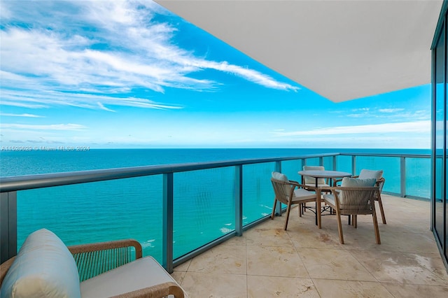 balcony featuring a water view