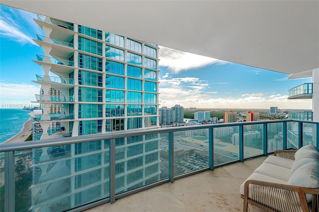 balcony featuring a water view