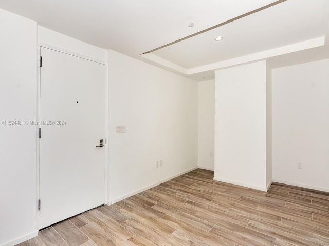 unfurnished room featuring light hardwood / wood-style flooring