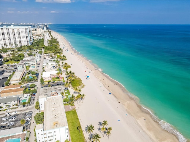 aerial view featuring a water view and a view of the beach