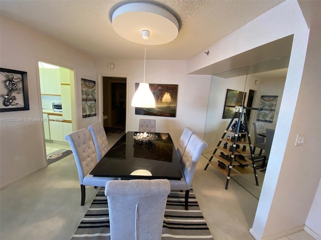 dining area with carpet