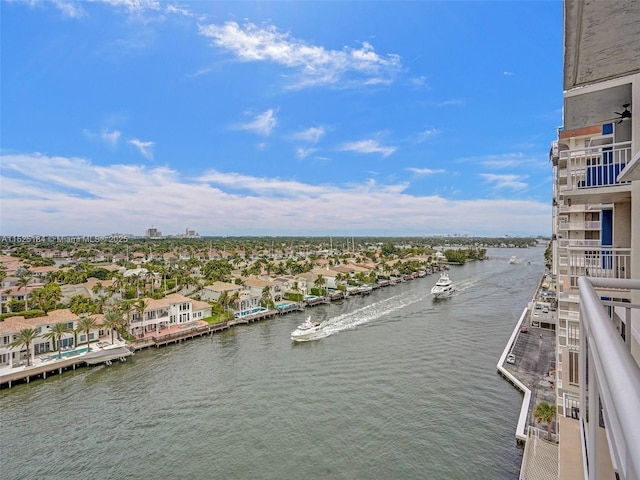 exterior space featuring a water view and a residential view