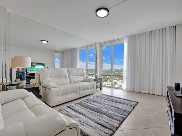 tiled living room featuring expansive windows