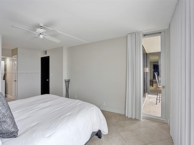 bedroom featuring light tile patterned floors, baseboards, visible vents, a ceiling fan, and access to exterior