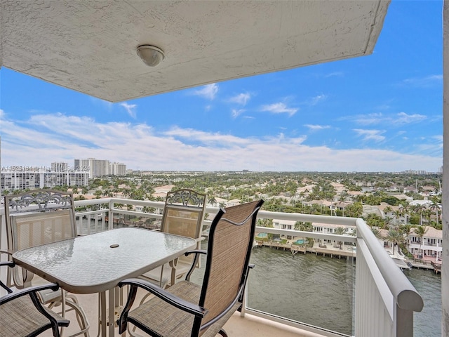 balcony featuring a water view