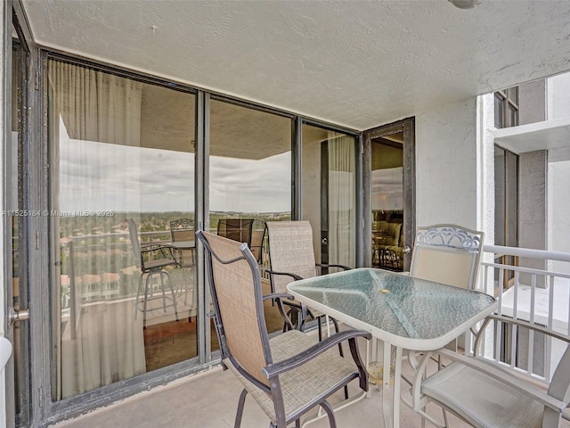 balcony featuring outdoor dining space