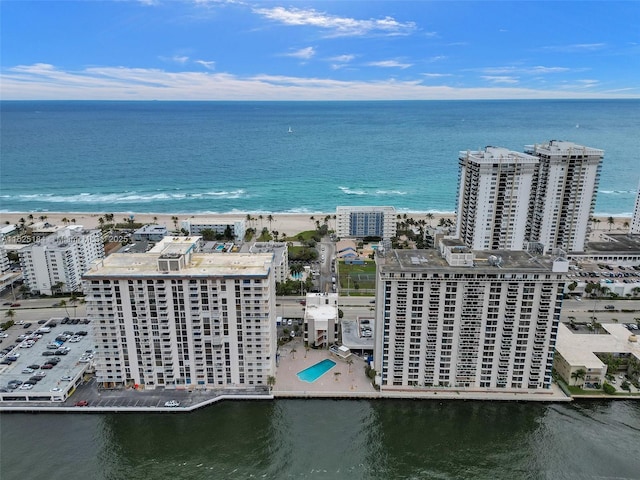 bird's eye view featuring a view of city and a water view