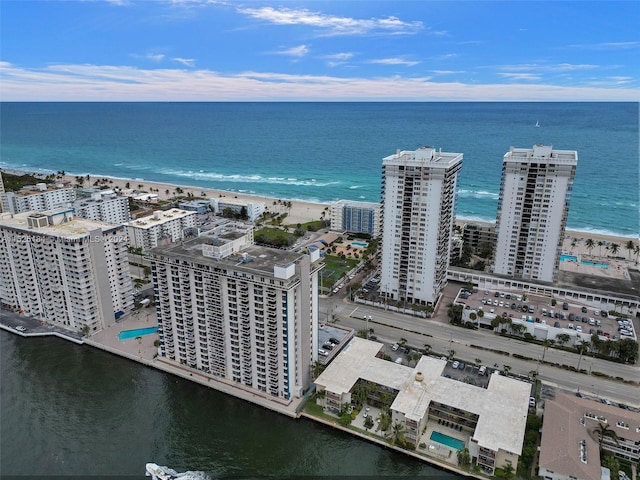 aerial view featuring a water view and a view of the beach