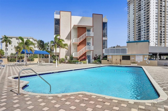 pool with a patio area