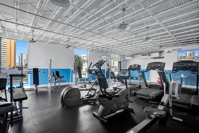 gym featuring baseboards