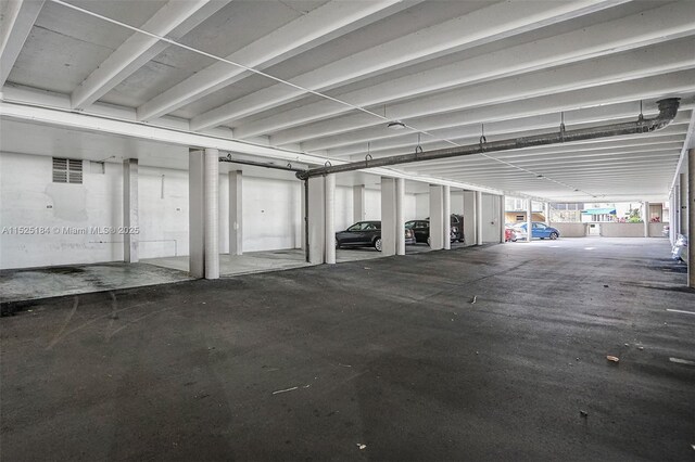 garage with a carport