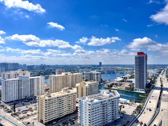 property's view of city featuring a water view