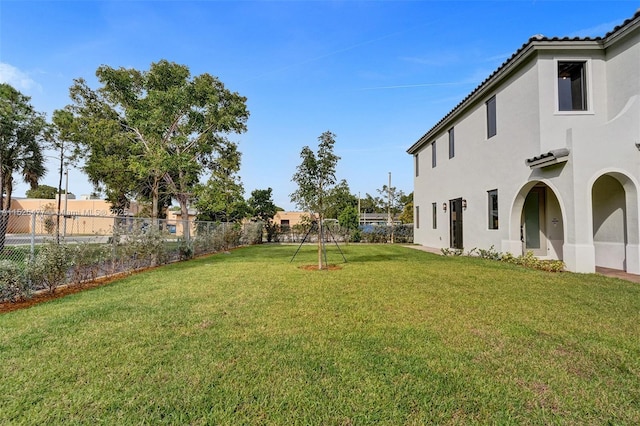 view of yard with a fenced backyard