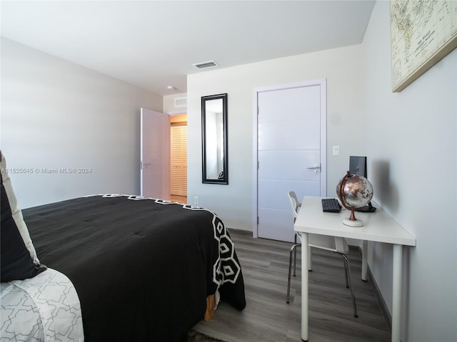 bedroom featuring hardwood / wood-style flooring