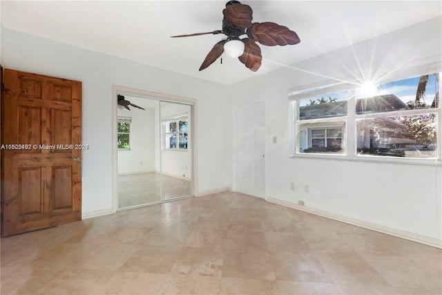 empty room with ceiling fan