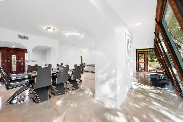 dining area with light tile floors