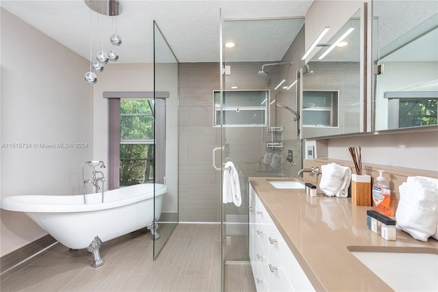 bathroom featuring tile floors, walk in shower, and a wealth of natural light