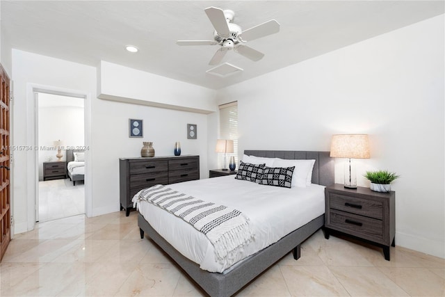 tiled bedroom featuring ceiling fan