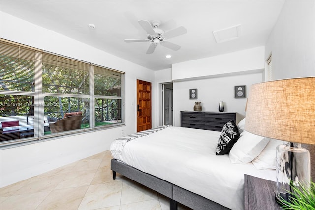 bedroom with ceiling fan and light tile flooring