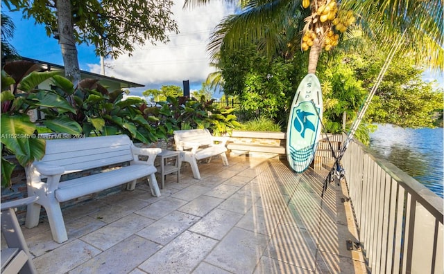 view of patio / terrace featuring a water view