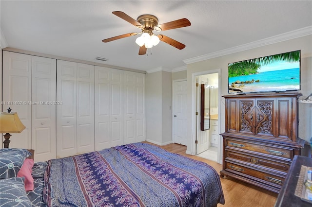 bedroom with connected bathroom, ceiling fan, crown molding, and light wood-type flooring