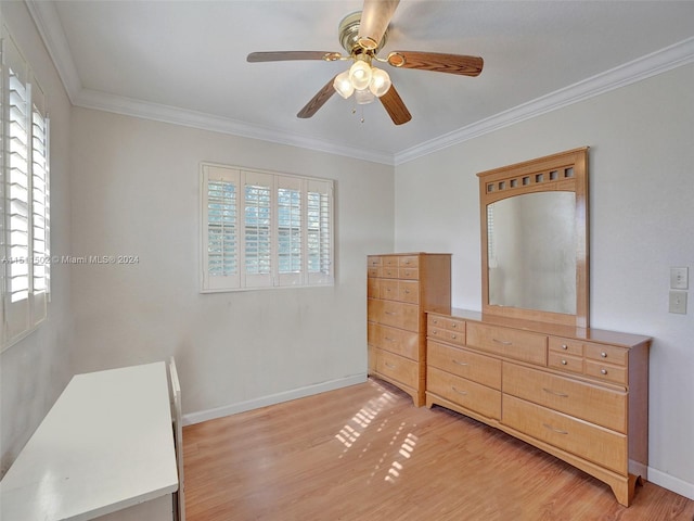 bedroom featuring light hardwood / wood-style flooring, ceiling fan, and ornamental molding