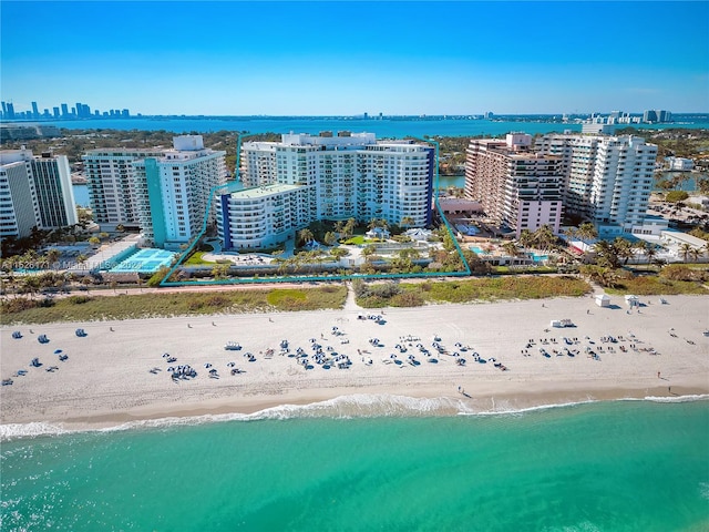 aerial view with a beach view and a water view