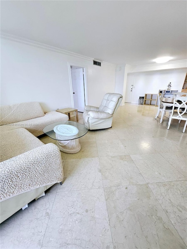 tiled living room with crown molding