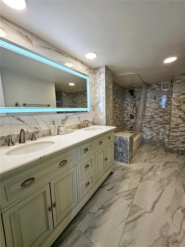 bathroom with tile walls, double vanity, and tile floors