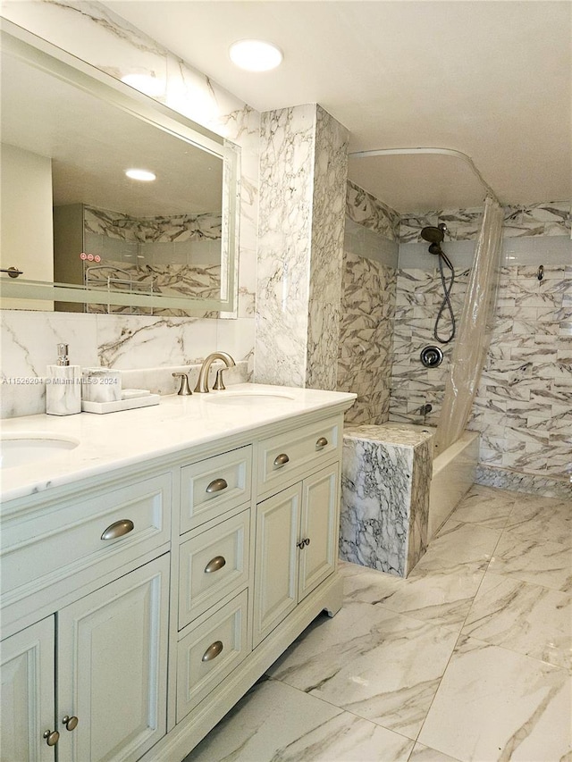 bathroom featuring double sink vanity, tile walls, tile flooring, and tiled shower / bath combo