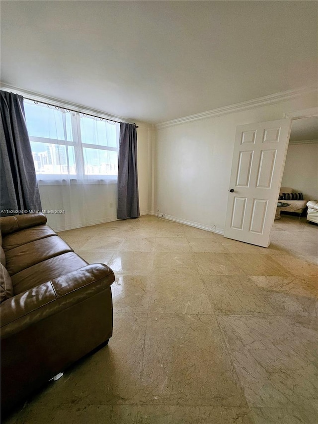 living room with ornamental molding