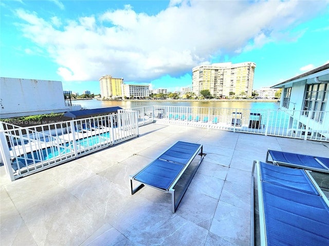 view of terrace featuring a community pool