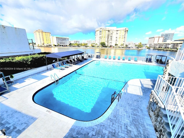 view of pool featuring a patio