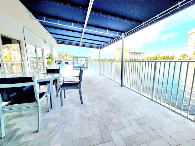 view of patio with a balcony