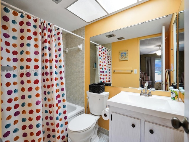 full bathroom featuring toilet, vanity, ceiling fan, and shower / tub combo