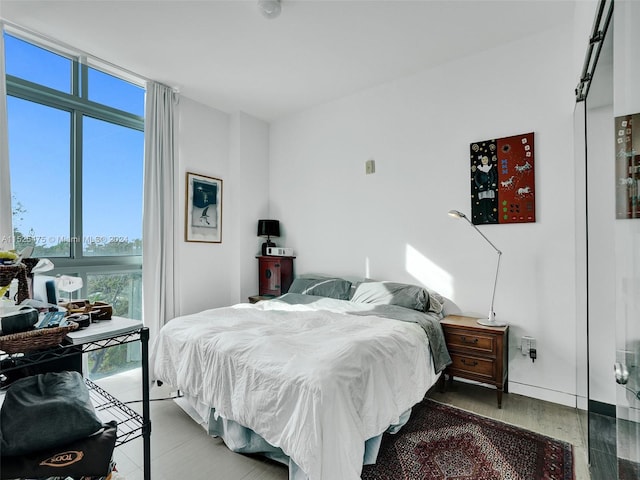 bedroom with wood-type flooring