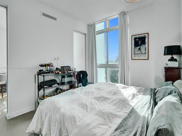 bedroom with light carpet