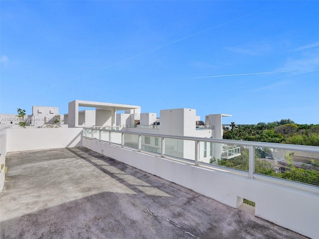 view of patio featuring a balcony