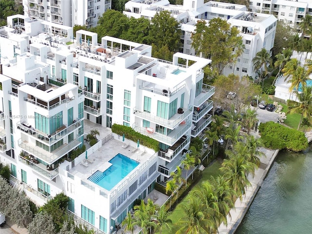 birds eye view of property featuring a water view