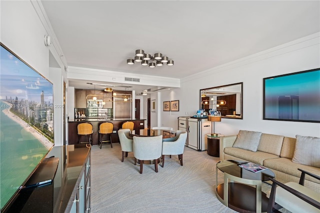 kitchen with a breakfast bar, decorative light fixtures, sink, backsplash, and stainless steel appliances