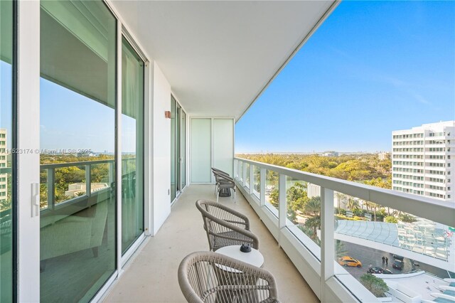 birds eye view of property with a view of the beach and a water view