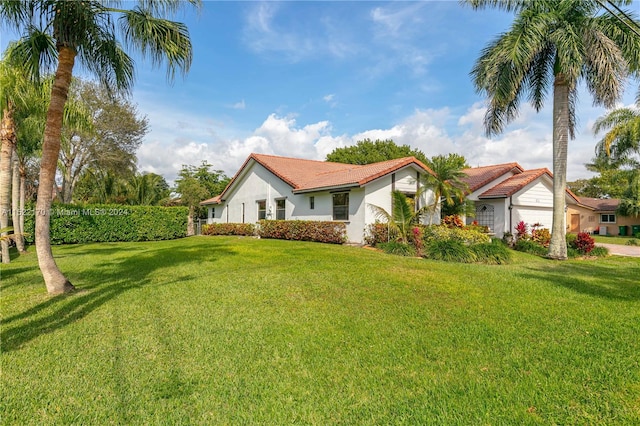 view of property exterior with a lawn